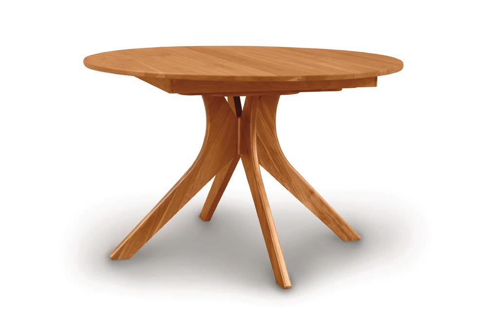 Audrey Round Extensions Table with Self Storing Leaf