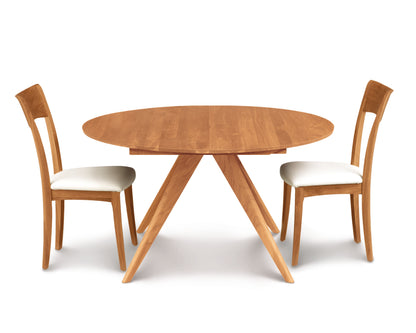 Catalina Round Extensions Table with Self Storing Leaf by Copeland Furniture