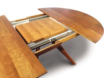 Catalina Round Extensions Table with Self Storing Leaf by Copeland Furniture